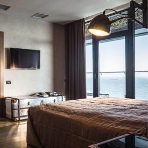 Кровать или кровати в номере M1 Club Hotel