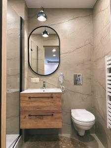 Kúpeľňa v ubytovaní Jaworowe Izby Apartamenty z balią z hydromasażem + 37 fotografií