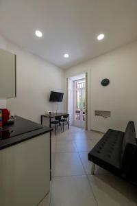Μια τηλεόραση ή/και κέντρο ψυχαγωγίας στο Casa Vacanze Nemesi TYCHE