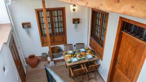 an overhead view of a room with a table and chairs at CHC - La Oliva I in Buenavista del Norte