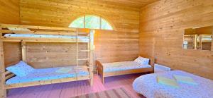 Letto o letti in una camera di Jõekääru Camping
