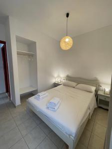Postel nebo postele na pokoji v ubytování Petra Casa