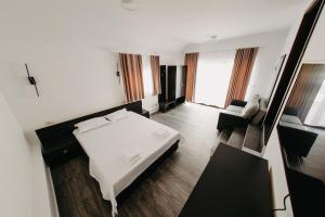 Postel nebo postele na pokoji v ubytování Cazare Băile Figa -The Home DRM + 35 fotografií