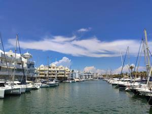 a group of boats docked in a marina at Benalbeach Paradise in Benalmádena