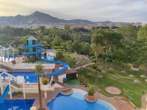 an aerial view of a resort with a water slide at Benalbeach Paradise in Benalmádena
