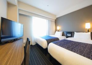 TV a/nebo společenská místnost v ubytování APA Hotel Sakai Ekimae