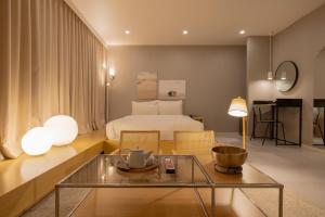 Postel nebo postele na pokoji v ubytování Object AanK Hotel Gumi