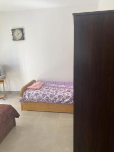 Postel nebo postele na pokoji v ubytování امواج