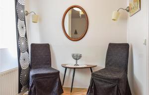 Khu vực ghế ngồi tại 3 Bedroom Beautiful Home In Blankaholm