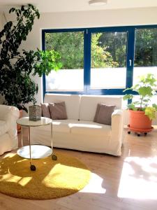 Posezení v ubytování Große Ferienwohnung zwischen Kassel und Göttingen auf dem Land