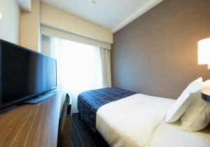 TV a/nebo společenská místnost v ubytování APA Hotel Sakai Ekimae