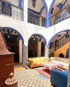 Postel nebo postele na pokoji v ubytování Riad Tassili Chaouen