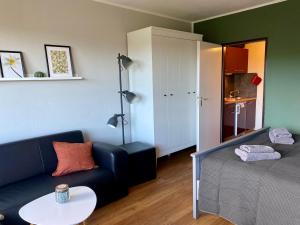 Posezení v ubytování Ferienwohnung Strandhafer + 6 fotografií