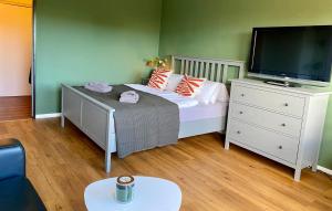 Postel nebo postele na pokoji v ubytování Ferienwohnung Strandhafer