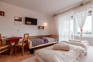 Postel nebo postele na pokoji v ubytování Noclegi z widokiem