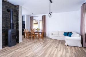 Et opholdsområde på Golf & Lake House 14 + 8 billeder