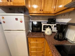 A kitchen or kitchenette at Apartament Montana