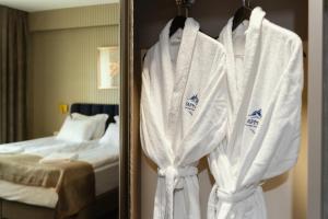 Voodi või voodid majutusasutuse Hotel Sapphire Bakuriani toas