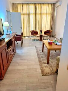 Posezení v ubytování L'Amitié Hôtel N'Djamena