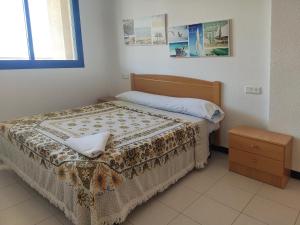 Posteľ alebo postele v izbe v ubytovaní Apartamentos Surfing 3000