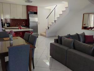 A kitchen or kitchenette at Maria's City Villa