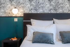 Nemea Appart Hotel Toulouse Aéroport客房内的一张或多张床位