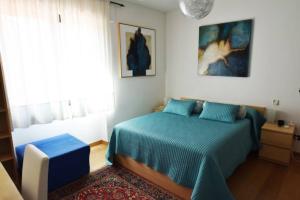 A bed or beds in a room at Villa il Cedro