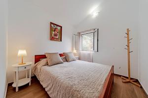 Postel nebo postele na pokoji v ubytování Robinson House Zrnovo (3637)