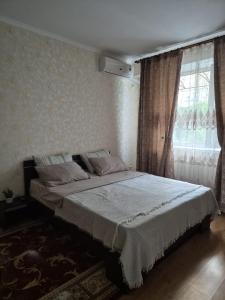 Postel nebo postele na pokoji v ubytování spatios si linistit