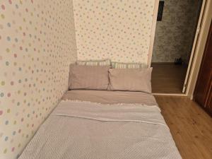 Postel nebo postele na pokoji v ubytování spatios si linistit