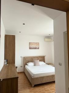 Postel nebo postele na pokoji v ubytování GuestHouse Cami