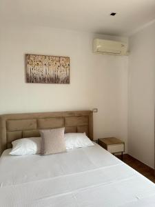 Postel nebo postele na pokoji v ubytování GuestHouse Cami