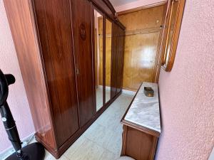A bed or beds in a room at Apartament Montana