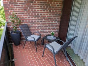Patio nebo venkovní prostory v ubytování Apartment mit Balkon und Pool, zentral am Waldrand