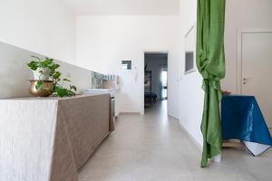 Kuchyň nebo kuchyňský kout v ubytování Casa Fiorita Apartment & Free Parking - Lecce Selection