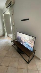 TV a/nebo společenská místnost v ubytování Dar Khalilo