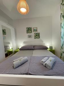 Posteľ alebo postele v izbe v ubytovaní Apartmenthouse Ines