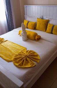 Ένα ή περισσότερα κρεβάτια σε δωμάτιο στο Cosyhomes