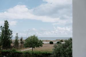 a view of the ocean from a house at Le Vele Apartment San Salvo Marina in Marina di Montenero
