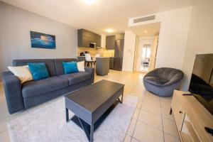 Posezení v ubytování La terrasse d'Ernest T2 recent,Terrasse, Clim, CV + 4 fotografie