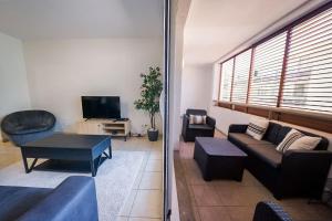 Posezení v ubytování La terrasse d'Ernest T2 recent,Terrasse, Clim, CV