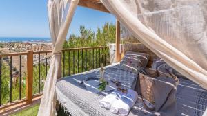 A balcony or terrace at Casa La Yedra Algarrobo by Ruralidays