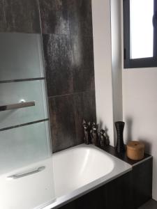 Koupelna v ubytování OasisBeach Penthousse la Zénia