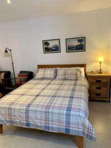 Postel nebo postele na pokoji v ubytování Maison Alriad - Alojamiento familiar tranquilo cerca del mar con jardín, porche y parking privado en el interior de la finca no apto para fiestas