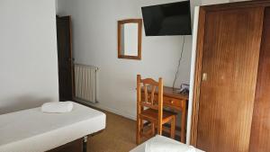 TV a/nebo společenská místnost v ubytování Hotel Nuevo Julios by Olda