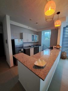 Kuchyň nebo kuchyňský kout v ubytování Apartamento Playa Corona