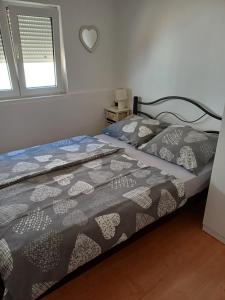 Posteľ alebo postele v izbe v ubytovaní Apartments Jurić - Zablaće
