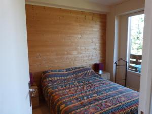 Postel nebo postele na pokoji v ubytování Appartement le Gray d'albion Praloup