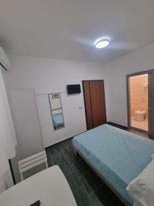 Postel nebo postele na pokoji v ubytování Piazza Salotto