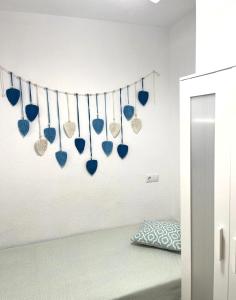 Postel nebo postele na pokoji v ubytování Los colores del Mar